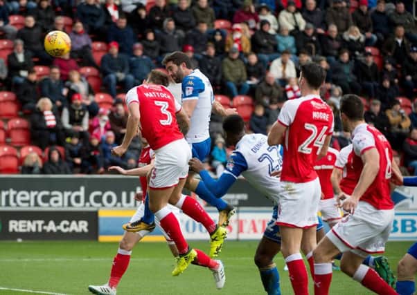 Will Grigg scoring the opening goal at Rotherham