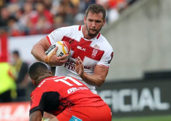 Sean O'Loughlin takes on the Tonga defence. NRL Photos