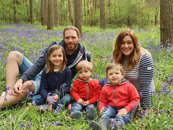 Gemma Brushneen with her husband Elliott and children Izzie, seven, Ollie, four, and Mason, two