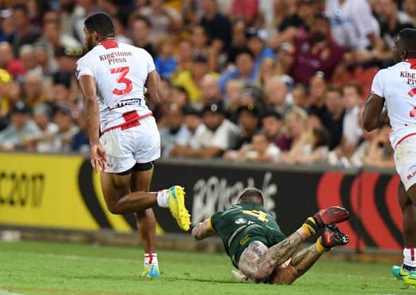 Kallum Watkins makes a break in the World Cup Final, but is brought down with an ankle tap. NRL Photos
