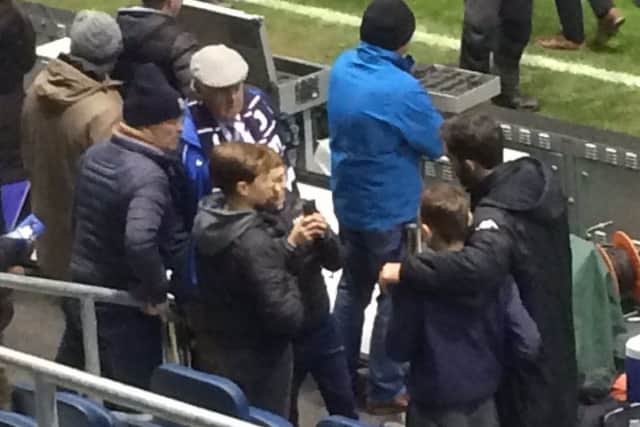 Will Grigg spent a long time signing autographs and posing for pictures after the full-time whistle on Friday