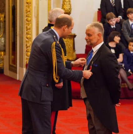 Brian Noble receives his MBE
