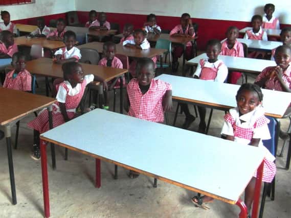 Donated chairs being used at a school in Africa