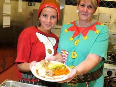 School cook Julie Wilson and her assistant Rachel Littler with some of their festive fare