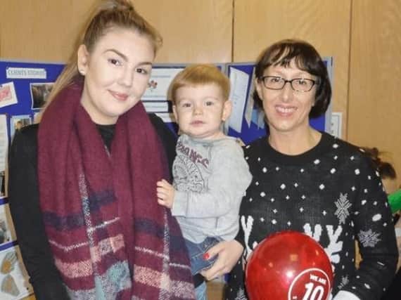 Chloe Hardy and son Oliver with family nurse Joanne Hill