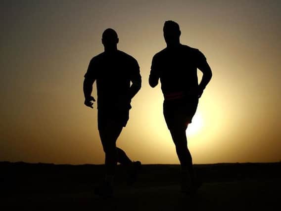Running with a friend can help spur you on to reach new goals