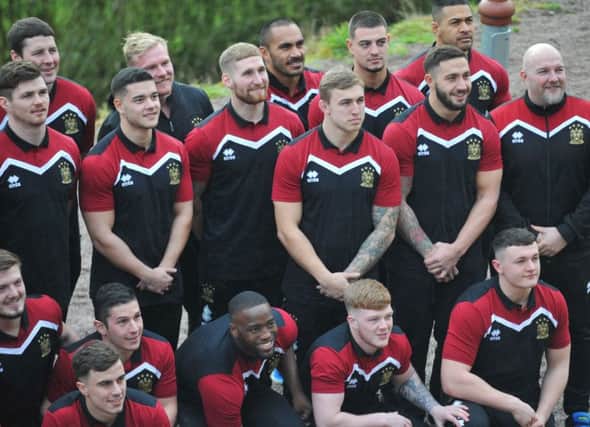Romain Navarrete (second from right, middle row) was among the Wigan players at Haigh Hall for their media day