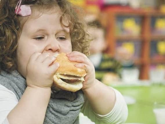 Figures provided by Public Health England show that 37 per cent of children in the borough left primary school with weight problems. Picture posed by model