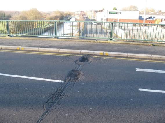A pothole on Scot Lane spotted by Ian Hall
