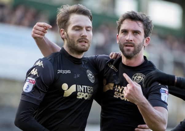Nick Powell and Will Grigg