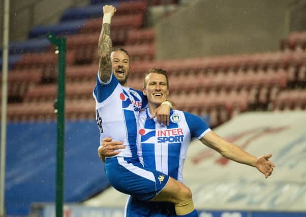 Noel Hunt and Dan Burn celebrate against Bournemouth