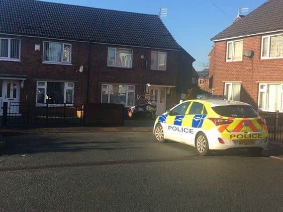Police at the scene in Wigan
