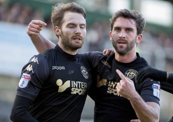 Nick Powell and Will Grigg