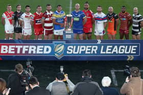 Players from the 12 Super League clubs at the competition's launch in Huddersfield