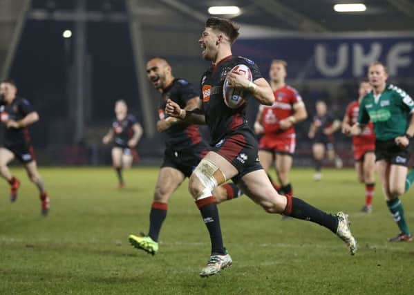 Wigan Warriors Oliver Gildart celebrates as he runs in his sides sixth try during the Betfred Super League match at the AJ Bell Stadium, Salford