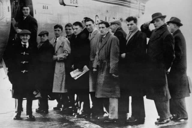 Walter Crickmer (far left) with the Manchester United team, boarding the plane headed to Belgrade