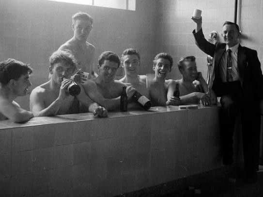 Walter Crickmer with the Manchester United title winning side of 1957