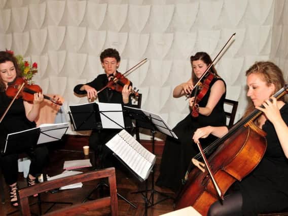 A string quartet performing
