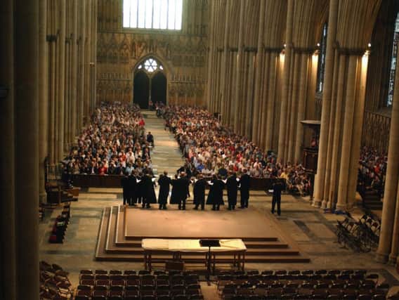 Vocal group The Sixteen performing in York Minster