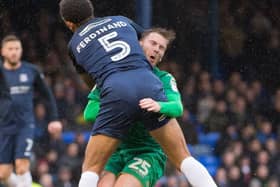 Nick Powell is poleaxed by Anton Ferdinand at Southend