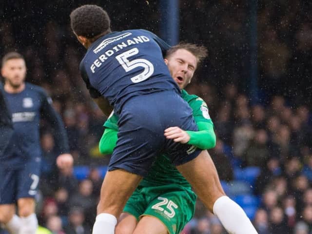Nick Powell is poleaxed by Anton Ferdinand at Southend