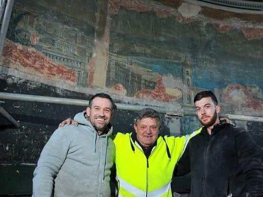 Contractors, from left, John Barnwell, Jimmy Maher and Adam Burton, who discovered the incredible artwork