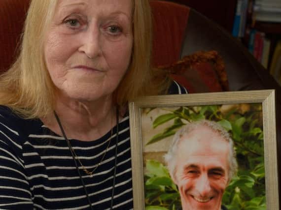 Val Fenton with a photo of husband Keith