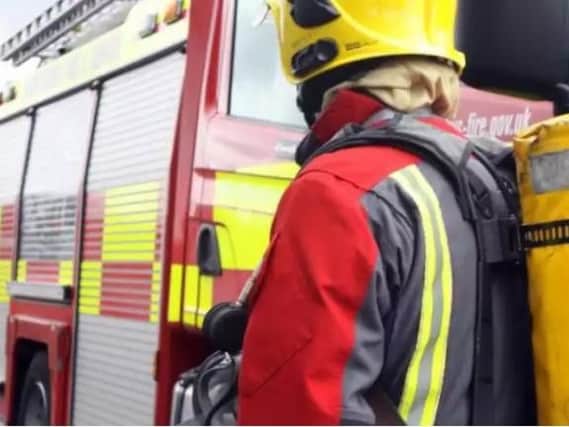 Neighbours alerted firefighters to the fire at a Wigan flat