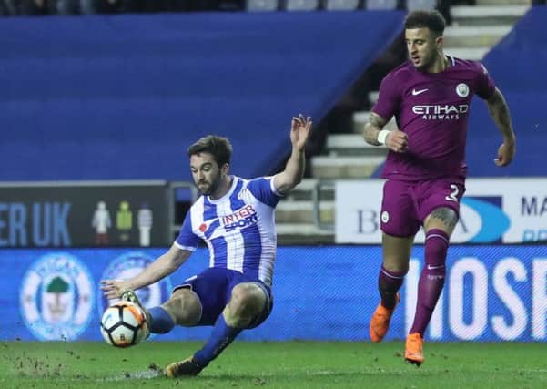 Will Grigg scores against Manchester City