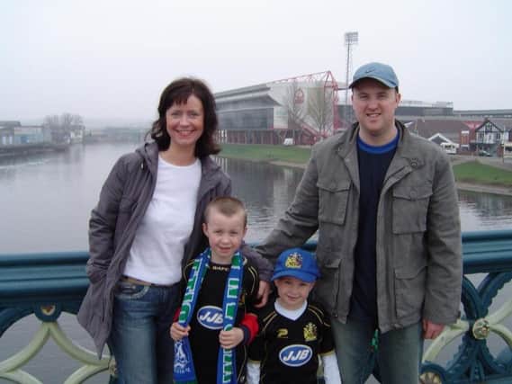Annette Birchall with young Louis and Sam and husband Anthony