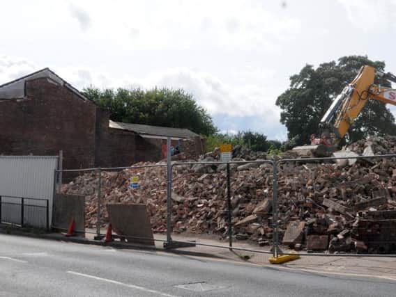 The former Ashton Town Hall being demolished