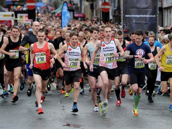 Runners set off in the half marathon at last year's Run Wigan Festival