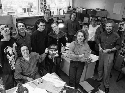 Stuart Maconie, (middle left, second left) at the NMEs offices in 1990 during his time as a staff writer on the music magazine