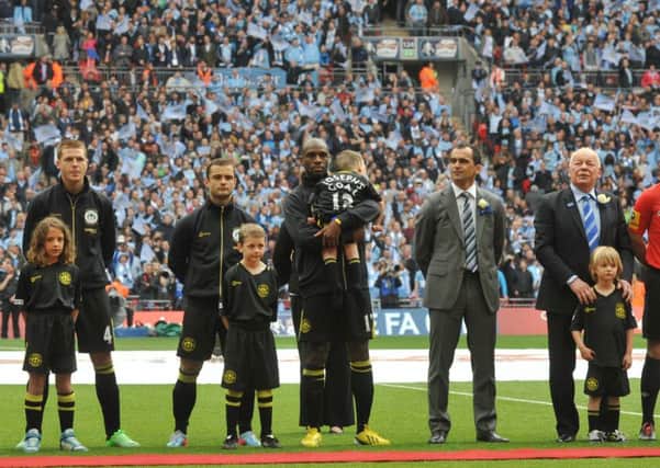 FA Cup final 2013 at Wembley  - Wigan Athletic v Manchester City
Joseph Kendrick the inspiration to Joseph's Goal charity, led out the Wigan Athletic team, carried by Latics team captain Emmerson Boyce.