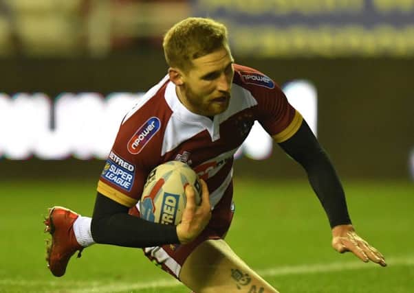 Fans are divided on how the full-backand half back 
roles should be split between Sam Tomkins and Morgan Escare