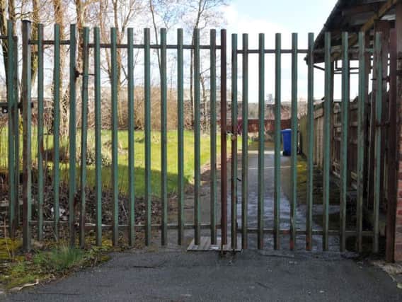 The gates are locked at St William's Parish Hall Ince