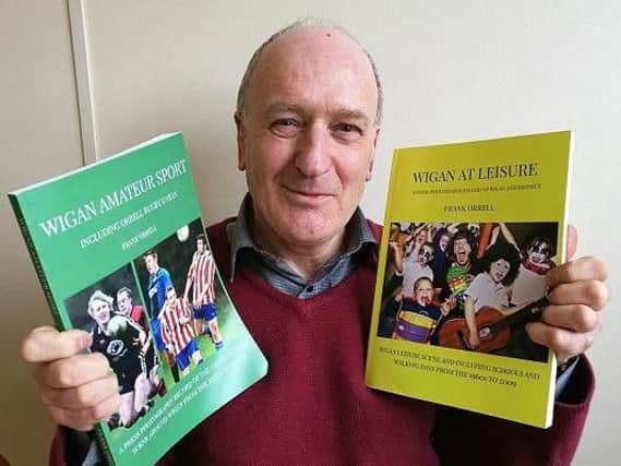Frank Orrell with his books