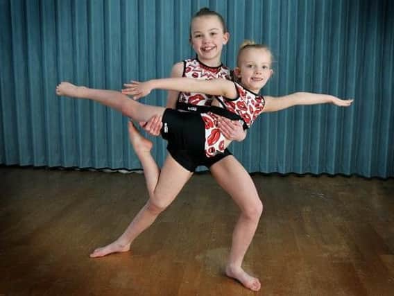 Dancing duo Lillie Cairns, nine, and Saffron Taylor, seven, right