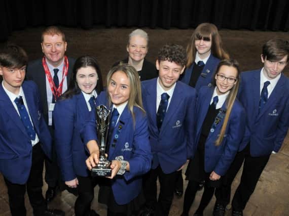The Cansfield High School students who won an enterprise challenge, with Dave Darby, from St John Rigby College, and Cansfield teacher Jenni Ward