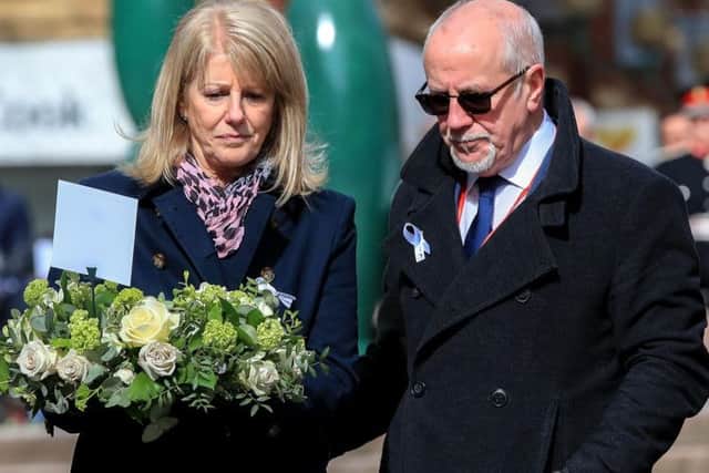 Tim's parents Wendy and Colin placed wreaths in Warrington to mark the anniversary