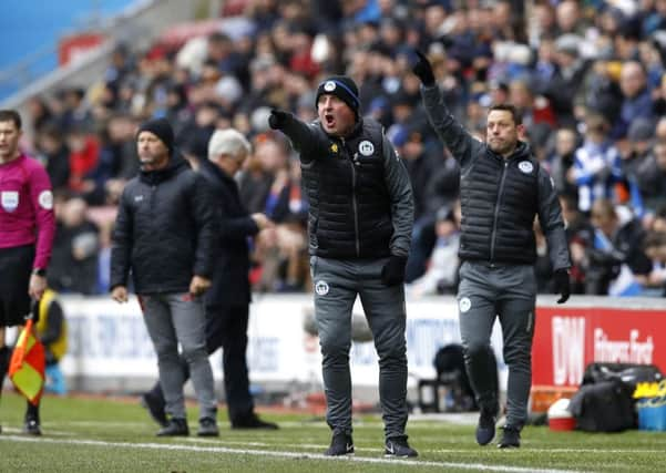 Leam Richardson (right) with Latics boss Paul Cook