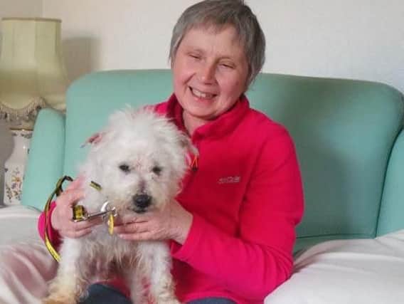 Margaret with her new four-legged friend, Snowy