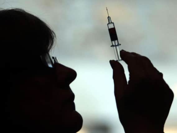 Workers across the care home sector in Wigan have been offered free flu jabs