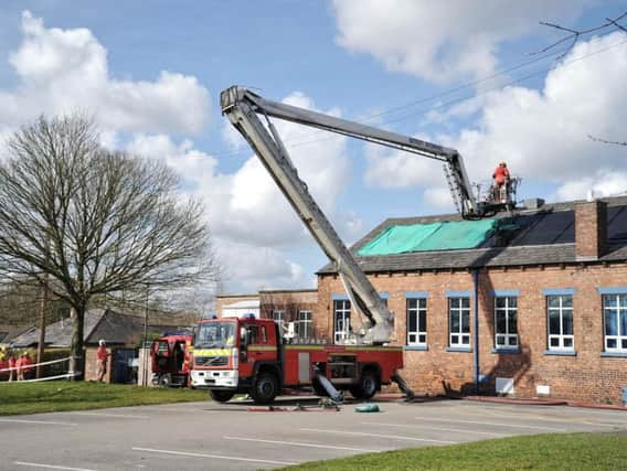 Firefighters working at the school