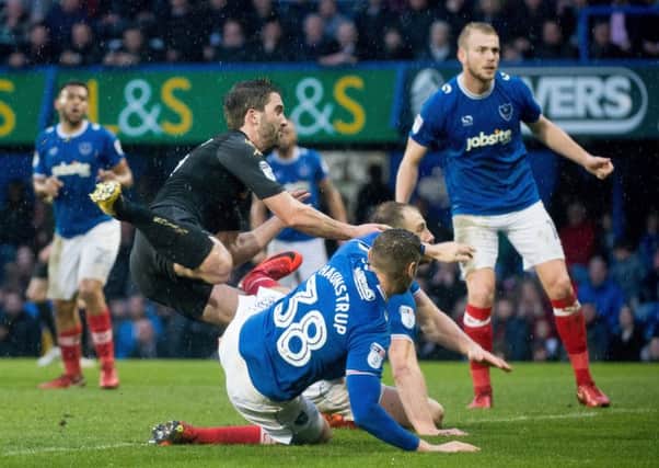 Will Grigg's late goal wasn't enough to get Latics anything at Portsmouth