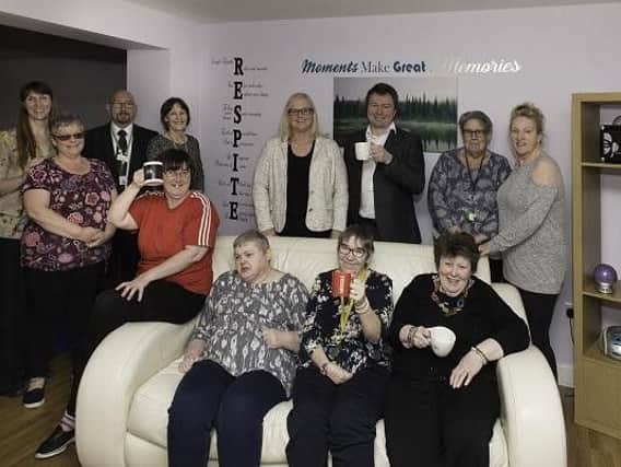 Stuart Cowley (third right, back row) with Coppull Lane Respite Centre residents