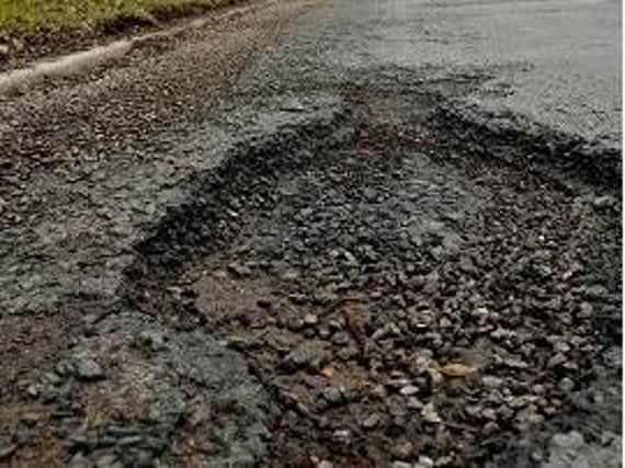 An extra 369,000 has been awarded by the government to repair potholes