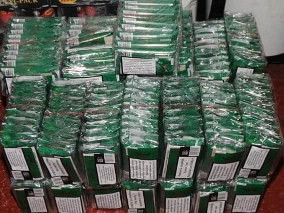 Cash and cigarettes were seized