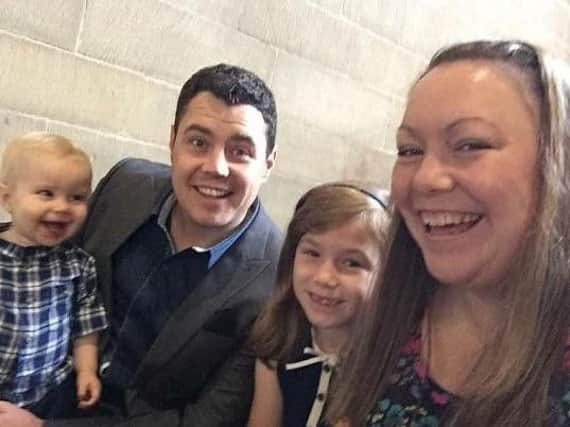Chris Cowley with wife Becky and children Sam and Lily