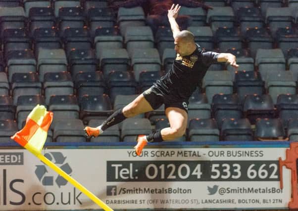 James Vaughan celebrates scoring the second goal at Rochdale